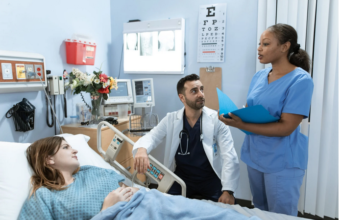 an orthopaediic surgeon and nurse at work